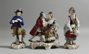 A PAIR OF SAMSON FIGURES OF A GARDENER AND A LADY with watering can. 6ins high, and a group, GALLANT