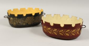 A PAIR OF REGENCY TOLEWARE TWO HANDLED BOWLS. 10ins diameter.