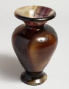 A BLUE JOHN VASE. 6.5ins high.