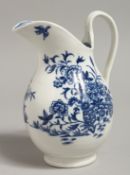 A WORCESTER ATTRACTIVE EWER printed with a fence and flowers.