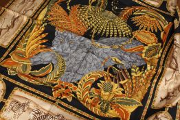 SALVATORE FERRAGAMO SILK SCARF, with animals; tigers, giraffes etc.. 136ins x 36ins.