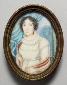 AN EARLY CONTINENTAL OVAL MINIATURE OF A LADY. 2.25ins x 1.75ins.
