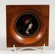A GOOD LIMOGES CIRCULAR FRAMED PORTRAIT PLAQUE.
