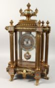 A GOOD LOUIS XVITH DESIGN GLASS METAL AND CLOISONNE CLOCK, with urn finial and six column supports.