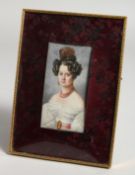 A GOOD MINIATURE OF A LADY in an easel frame. 4ins x 2ins.