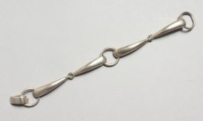 A LISA JENKINS SILVER BRACELET.