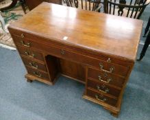 A GEORGE III DESIGN MAHOGANY KNEEHOLE DESK with a writing slide, long drawer over a kneehole,