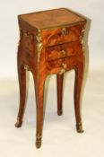 A SMALL 19TH CENTURY FRENCH KINGWOOD AND ORMOLU WORK TABLE, with rising top, two small drawers on