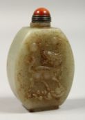 A CHINESE CARVED JADE SNUFF BOTTLE, 2.5ins.