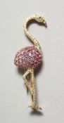 AN 18CT.WHITE AND YELLOW GOLD TULIP FLAMINGO set with pink sapphires and diamonds