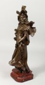 EN VISTE PAR A. NELSON. A 19TH CENTURY FRENCH BRONZED SPELTER FIGURE OF A YOUNG LADY, on a marble