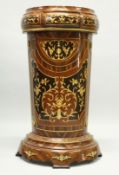 AN INLAID DEMI LUNE PEDESTAL with single drawer 3ft 7ins high.