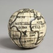 A BONE GLOBAL COMPASS 2.75ins diameter.