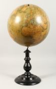 A GLOBE TERRESTRE by A. BENOITS & CO. PARIS. 12ins diameter on a wooden stand.