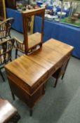 A GILLOWS GENTLEMAN'S MAHOGANY DRESSING TABLE, with rising mirror and flaps opening to reveal