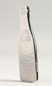 A CHAMPAGNE BOTTLE SHAPED PENKNIFE.
