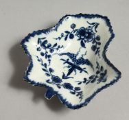 AN 18TH CENTURY WORCESTER LEAF SHAPED PICKLE DISH painted with trailing vines, painters mark.