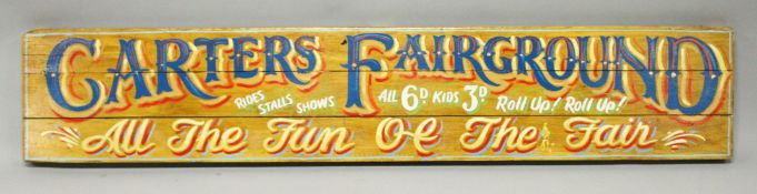 A LONG PAINTED CARTERS FAIRGROUND SIGN, 7ft long.