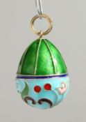 A RUSSIAN SILVER ENAMEL EGG PENDANT.