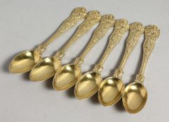 A SET OF SIX VICTORIAN SILVER GILT STAG PATTERN TEA SPOONS. London 1868. Maker George Adams.