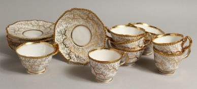 A WORCESTER FLIGHT BARR AND BARR set of six gadroon bordered tea cup and saucers and three coffee
