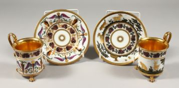 A GOOD PAIR OF 19TH CENTURY FRENCH PORCELAIN CUPS AND SAUCERS, one with gilt dog and goats the other