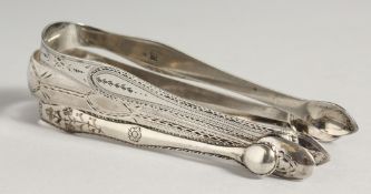 THREE PAIRS OF SUGAR TONGS including two bright cut. London 1792, maker Peter and Ann Bateman.