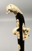A BONE GUN WALKING STICK, 36ins long.