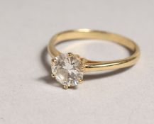 A GOOD 18CT GOLD SOLITAIRE DIAMOND RING.