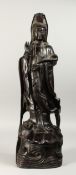 A LARGE CHINESE CARVED ROSEWOOD GUANYLIN FIGURE, 24ins high.