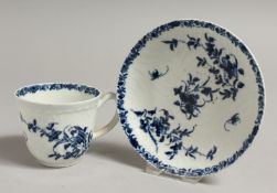 AN 18TH CENTURY WORCESTER COFFEE CUP AND SAUCER panited in blue with lambriquin border, workman's