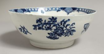 AN 18TH CENTURY LOWESTOFT BOWL printed with bouquets and moths to the sides and base with a hand