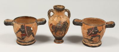A PAIR OF OLD TWO HANDLED POTTERY POTS with Egyptian scenes. 3.5ins high and a TWO HANDLED VASE 6ins
