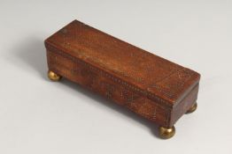 A NAPOLEONIC PRISIONER OF WAR PIQUET INLAID BOX with swivel top, on ball feet. 8ins high.