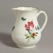 AN 18TH CENTURY RARE, SPARROW BEAK JUG, painted with flowers under a brown line border (minor
