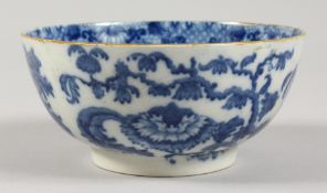 A 19TH CENTURY BLUE AND WHITE BOWL, painted with an urn of flowers. 5.25ins diameter.