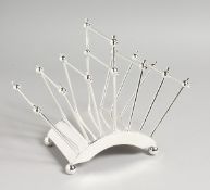 A CHRISTOPHER DRESSER DESIGN TOAST RACK.