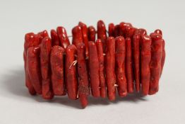 A CORAL FLEXIBLE BRACELET.