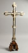 AN 18TH CENTURY OLIVE WOOD AND MOTHER OF PEARL JERUSALEM CRUCIFIX. 27ins high.