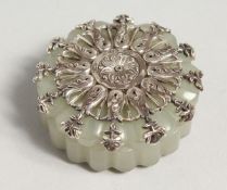 A SMALL RUSSIAN SILVER TOP CIRCULAR JADE BOX AND COVER. Stamped H.W. 84 5925. 2ins diameter.