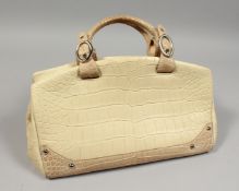 MADLER, A SALTWATER CROCODILE BAG, 14ins, with export documents.