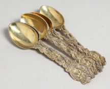 A SET OF SIX VICTORIAN SILVER GILT VINE PATTERN TEA SPOONS. London 1883. Maker Charles Boyton