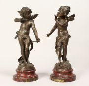 A PAIR OF 19TH CENTURY FRENCH BRONZES, CUPID AND PSYCHE on a circular base 