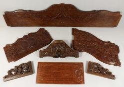 SEVEN PIECES OF CARVED WOOD, brackets, etc..