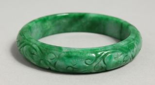A CARVED JADE BRACELET.