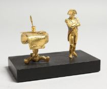 A NAPOLEON MODEL standing beside a table on a marble base.