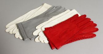 FOUR PAIRS OF LEATHER GLOVES, purchased from Harrods, London.