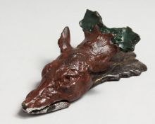 A VIENNED BRONZE FOXES HEAD PAPER CLIP. 6ins long.