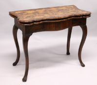 AN 18TH CENTURY ITALIAN FIGURED WALNUT FOLD-OVER CARD / TEA TABLE, of serpentine outline, with a