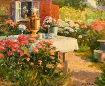 Yuri Kuchkin (b. 1942) Russian, 'A Corner in a Blooming Garden', oil on board, signed, 24cm x